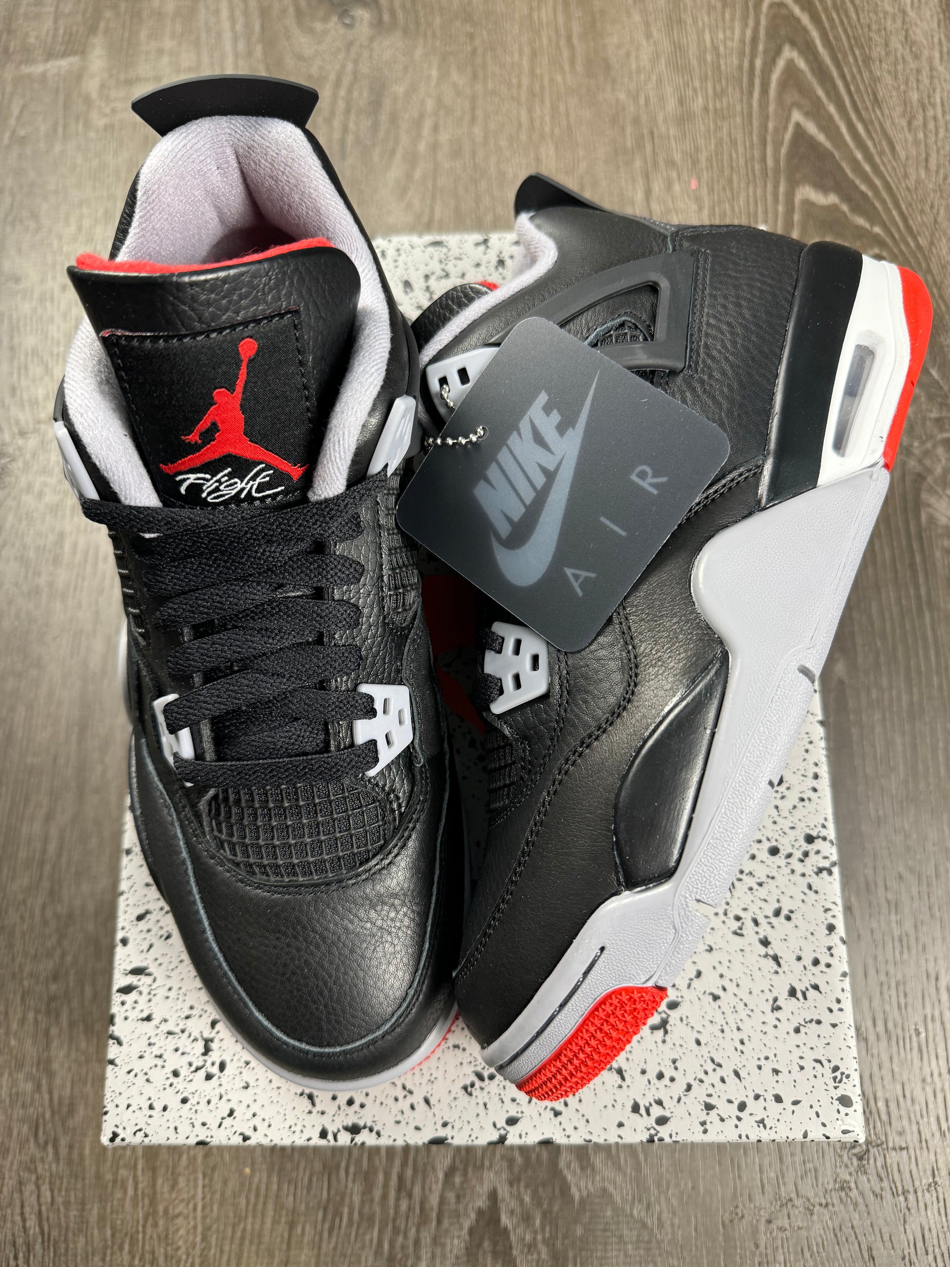 Jordan retro 4 bred grade school online